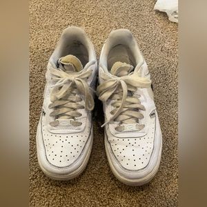 Nike shoes, white, they used but good condition, leather. Interchangeable swoosh